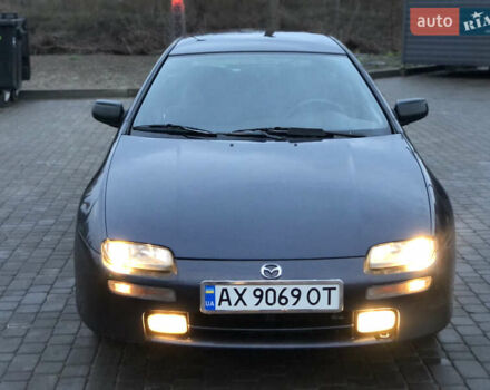 Серый Мазда 323, объемом двигателя 1.5 л и пробегом 199 тыс. км за 2000 $, фото 7 на Automoto.ua