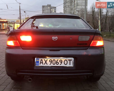 Серый Мазда 323, объемом двигателя 1.5 л и пробегом 199 тыс. км за 2000 $, фото 42 на Automoto.ua