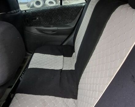 Серый Мазда 323, объемом двигателя 1.8 л и пробегом 480 тыс. км за 1400 $, фото 2 на Automoto.ua