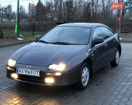 Серый Мазда 323, объемом двигателя 1.5 л и пробегом 199 тыс. км за 2000 $, фото 1 на Automoto.ua