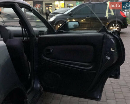 Серый Мазда 323, объемом двигателя 1.5 л и пробегом 199 тыс. км за 2000 $, фото 23 на Automoto.ua