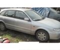 Серый Мазда 323, объемом двигателя 2 л и пробегом 10 тыс. км за 1 $, фото 1 на Automoto.ua