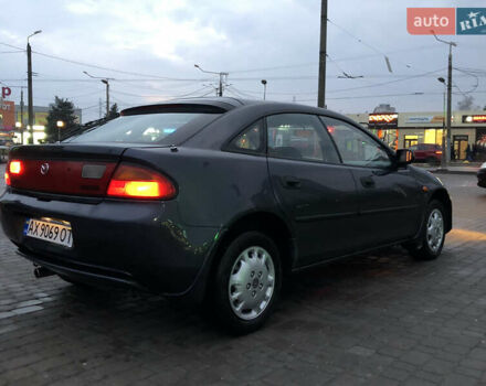 Серый Мазда 323, объемом двигателя 1.5 л и пробегом 199 тыс. км за 2000 $, фото 41 на Automoto.ua