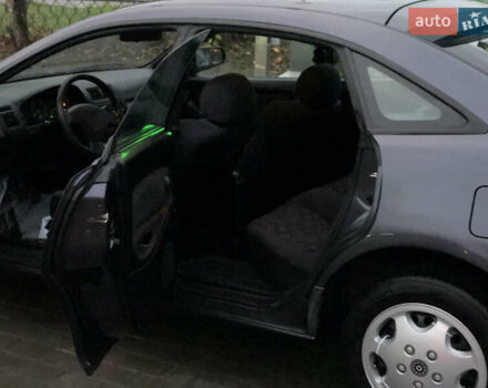 Серый Мазда 323, объемом двигателя 1.5 л и пробегом 199 тыс. км за 2000 $, фото 27 на Automoto.ua