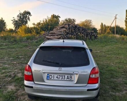 Сірий Мазда 323, об'ємом двигуна 1.84 л та пробігом 450 тис. км за 1900 $, фото 3 на Automoto.ua