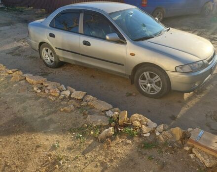 Сірий Мазда 323, об'ємом двигуна 1.5 л та пробігом 400 тис. км за 2383 $, фото 3 на Automoto.ua