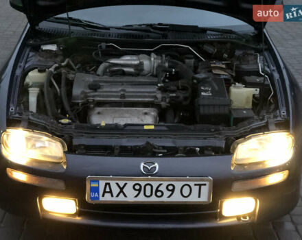 Серый Мазда 323, объемом двигателя 1.5 л и пробегом 199 тыс. км за 2000 $, фото 33 на Automoto.ua