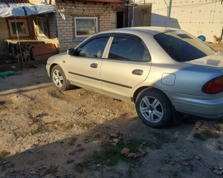 Сірий Мазда 323, об'ємом двигуна 1.5 л та пробігом 400 тис. км за 2383 $, фото 1 на Automoto.ua