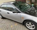 Серый Мазда 323, объемом двигателя 1.5 л и пробегом 300 тыс. км за 1706 $, фото 4 на Automoto.ua