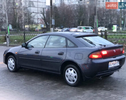 Серый Мазда 323, объемом двигателя 1.5 л и пробегом 199 тыс. км за 2000 $, фото 3 на Automoto.ua