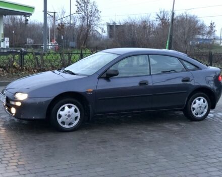 Сірий Мазда 323, об'ємом двигуна 1.5 л та пробігом 200 тис. км за 2500 $, фото 1 на Automoto.ua