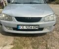 Серый Мазда 323, объемом двигателя 1.5 л и пробегом 285 тыс. км за 2050 $, фото 1 на Automoto.ua