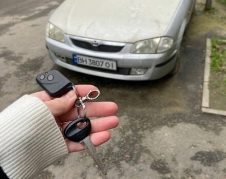 Серый Мазда 323, объемом двигателя 1.5 л и пробегом 250 тыс. км за 1901 $, фото 5 на Automoto.ua