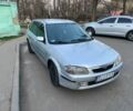 Серый Мазда 323, объемом двигателя 2 л и пробегом 304 тыс. км за 1999 $, фото 1 на Automoto.ua