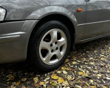 Серый Мазда 323, объемом двигателя 1.5 л и пробегом 315 тыс. км за 1300 $, фото 10 на Automoto.ua