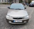 Серый Мазда 323, объемом двигателя 1.5 л и пробегом 230 тыс. км за 2800 $, фото 1 на Automoto.ua