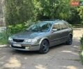 Серый Мазда 323, объемом двигателя 1.5 л и пробегом 405 тыс. км за 2150 $, фото 1 на Automoto.ua