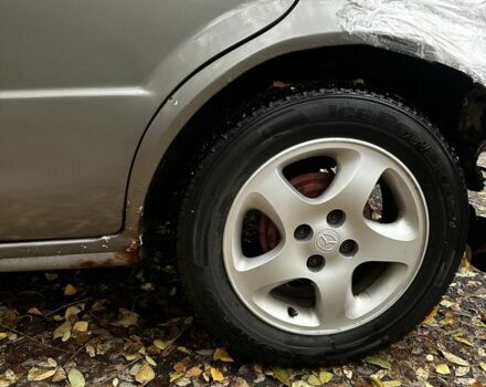 Серый Мазда 323, объемом двигателя 1.5 л и пробегом 315 тыс. км за 1300 $, фото 9 на Automoto.ua