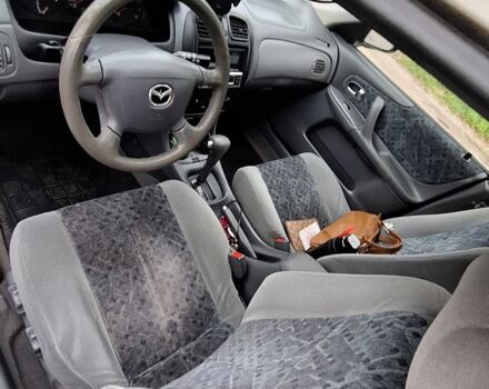 Серый Мазда 323, объемом двигателя 0 л и пробегом 170 тыс. км за 2200 $, фото 7 на Automoto.ua