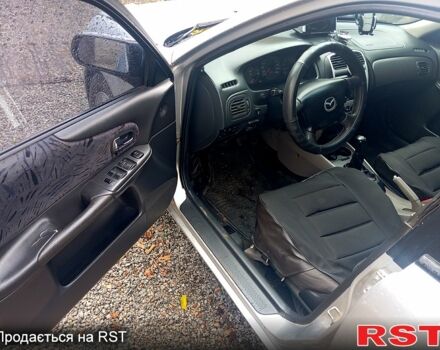 Сірий Мазда 323, об'ємом двигуна 1.8 л та пробігом 247 тис. км за 2200 $, фото 9 на Automoto.ua