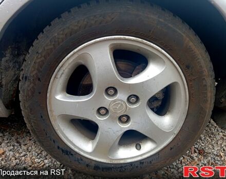 Сірий Мазда 323, об'ємом двигуна 1.8 л та пробігом 247 тис. км за 2200 $, фото 12 на Automoto.ua