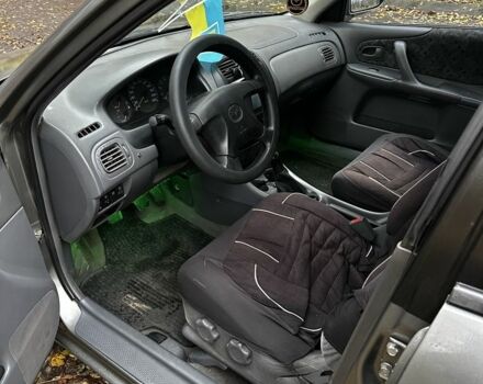 Серый Мазда 323, объемом двигателя 1.5 л и пробегом 315 тыс. км за 1300 $, фото 15 на Automoto.ua