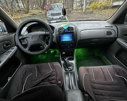 Серый Мазда 323, объемом двигателя 1.5 л и пробегом 315 тыс. км за 1300 $, фото 14 на Automoto.ua