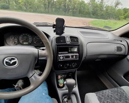 Серый Мазда 323, объемом двигателя 0 л и пробегом 170 тыс. км за 2200 $, фото 5 на Automoto.ua