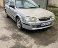 Серый Мазда 323, объемом двигателя 1.49 л и пробегом 250 тыс. км за 1900 $, фото 1 на Automoto.ua