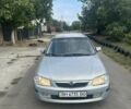 Сірий Мазда 323, об'ємом двигуна 1.5 л та пробігом 330 тис. км за 2004 $, фото 1 на Automoto.ua