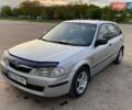 Сірий Мазда 323, об'ємом двигуна 2 л та пробігом 335 тис. км за 2150 $, фото 1 на Automoto.ua