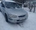 Серый Мазда 323, объемом двигателя 1.5 л и пробегом 315 тыс. км за 2800 $, фото 1 на Automoto.ua