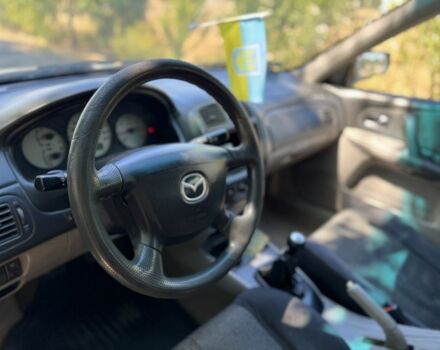 Сірий Мазда 323, об'ємом двигуна 2 л та пробігом 354 тис. км за 650 $, фото 8 на Automoto.ua