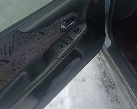 Серый Мазда 323, объемом двигателя 1.5 л и пробегом 315 тыс. км за 2800 $, фото 3 на Automoto.ua