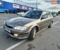 Серый Мазда 323, объемом двигателя 1.8 л и пробегом 292 тыс. км за 2250 $, фото 1 на Automoto.ua