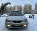 Серый Мазда 323, объемом двигателя 2 л и пробегом 300 тыс. км за 1350 $, фото 2 на Automoto.ua