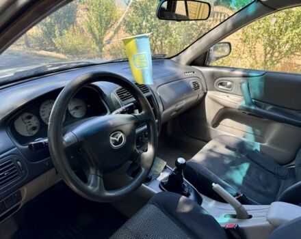 Сірий Мазда 323, об'ємом двигуна 2 л та пробігом 354 тис. км за 650 $, фото 9 на Automoto.ua