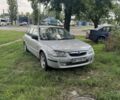 Серый Мазда 323, объемом двигателя 1.5 л и пробегом 100 тыс. км за 1995 $, фото 1 на Automoto.ua