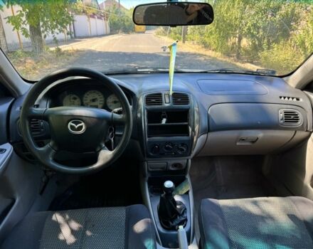 Сірий Мазда 323, об'ємом двигуна 2 л та пробігом 354 тис. км за 650 $, фото 7 на Automoto.ua