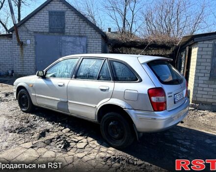 Серый Мазда 323, объемом двигателя 2 л и пробегом 284 тыс. км за 1500 $, фото 4 на Automoto.ua
