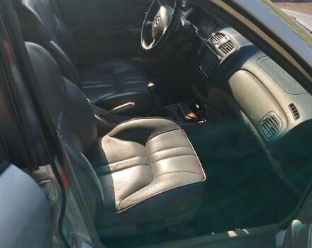 Сірий Мазда 323, об'ємом двигуна 2 л та пробігом 300 тис. км за 2906 $, фото 3 на Automoto.ua