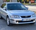 Серый Мазда 323, объемом двигателя 2 л и пробегом 430 тыс. км за 2300 $, фото 1 на Automoto.ua
