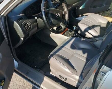 Сірий Мазда 323, об'ємом двигуна 2 л та пробігом 300 тис. км за 2906 $, фото 4 на Automoto.ua