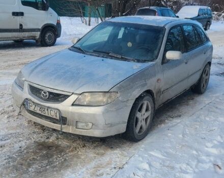Серый Мазда 323, объемом двигателя 2 л и пробегом 300 тыс. км за 950 $, фото 1 на Automoto.ua