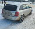 Серый Мазда 323, объемом двигателя 2 л и пробегом 300 тыс. км за 950 $, фото 3 на Automoto.ua
