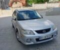 Серый Мазда 323, объемом двигателя 2 л и пробегом 258 тыс. км за 2999 $, фото 1 на Automoto.ua