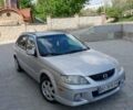 Серый Мазда 323, объемом двигателя 2 л и пробегом 258 тыс. км за 2800 $, фото 1 на Automoto.ua