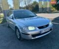 Серый Мазда 323, объемом двигателя 2 л и пробегом 430 тыс. км за 2300 $, фото 2 на Automoto.ua