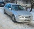Серый Мазда 323, объемом двигателя 2 л и пробегом 300 тыс. км за 950 $, фото 1 на Automoto.ua
