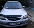 Серый Мазда 323, объемом двигателя 2 л и пробегом 335 тыс. км за 1800 $, фото 1 на Automoto.ua